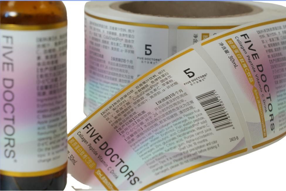Étiquette auto-adhésive personnalisée pour l'emballage Vinyle autocollant imperméable à l'eau Étiquette d'impression en rouleau Autocollant rond